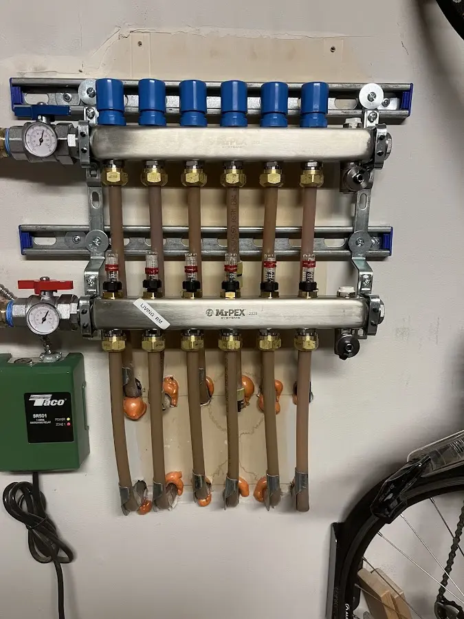 Plumber performing Water Heater Repair at a residential property in Fountainhead-Orchard Hills